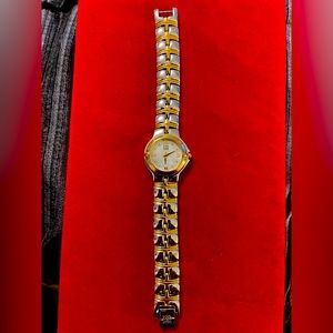 Movado- ESQ ladies watch movement made in Switzerland two tone w/ of pearl face